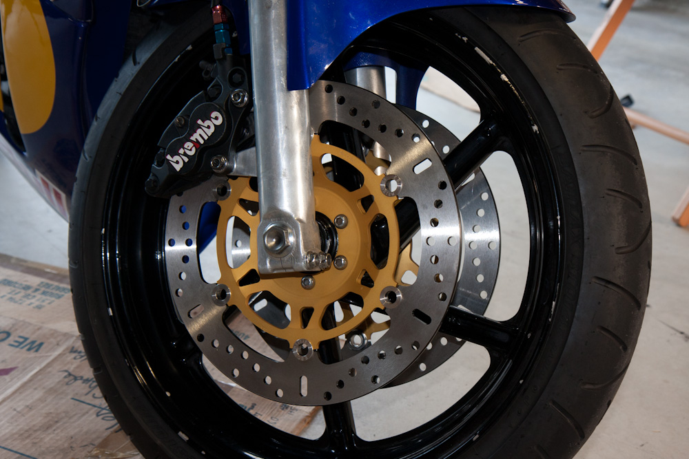 The new brake disk, looks spiffy with the gold colored center.