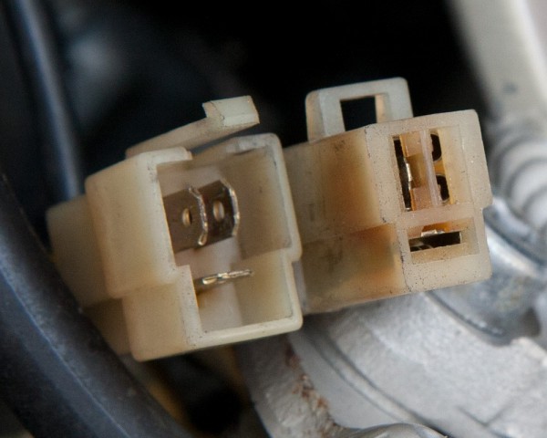 The alternator connection on the NC23. No melted insulation here, but the connector definitely looks distressed.