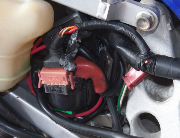 The new battery wiring. The MP630 fuse holder that replaces the master fuse can be seen behind the wires going to the starter solenoid.
