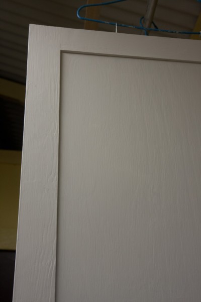 After being painted with Brushing Putty, the cabinets look like this.